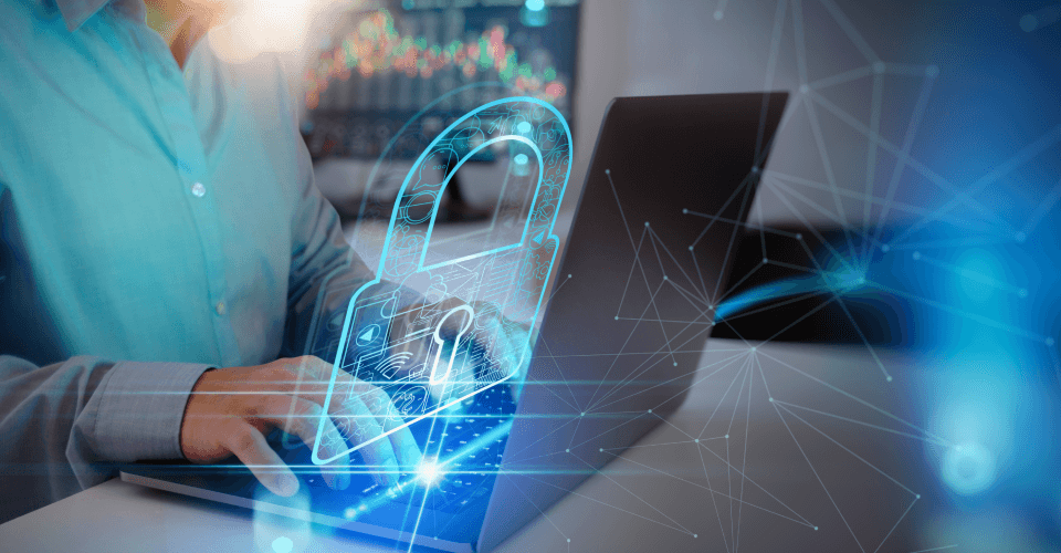 Elevating Mortgage Bfsi Operations: How Azure Cloud Solutions Drive Efficiency And Innovation 4 A user interacts with a futuristic holographic padlock symbol projected above a tablet, signifying advanced cybersecurity measures in the digital realm