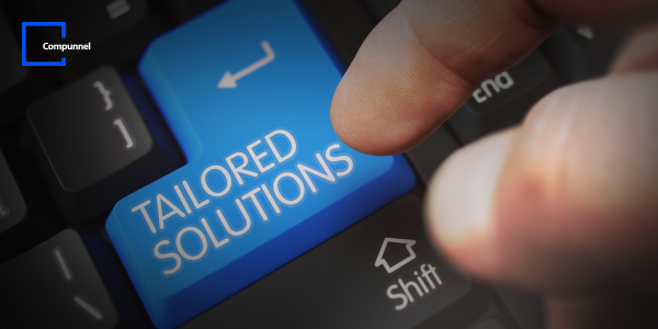 The Key To Agile Mortgage Bfsi Operations: Insights Into Power Platform Capabilities 5 Finger pressing a blue key labeled 'TAILORED SOLUTIONS' on a keyboard, emphasizing customized digital services
