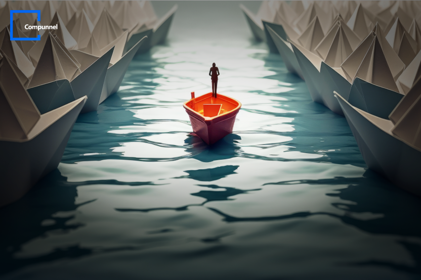 A business leader standing on a small red boat, navigating through a sea of paper boats, symbolizing innovation and leadership in the digital era with Compunnel's logo in the corner.